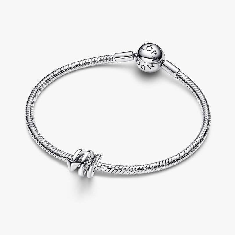 Twisting Arrow Charm