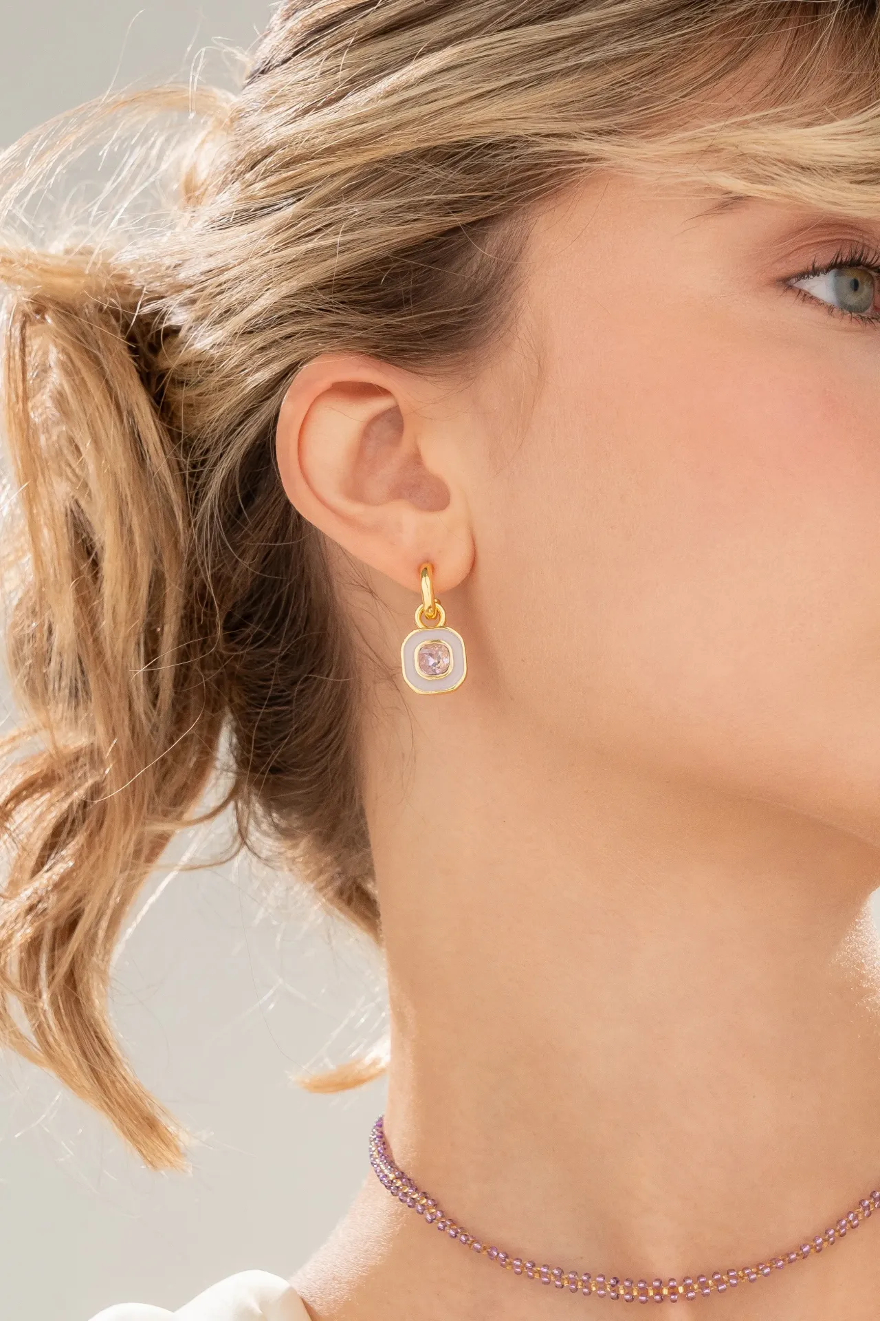 Argollas 2 en 1 cristal lila